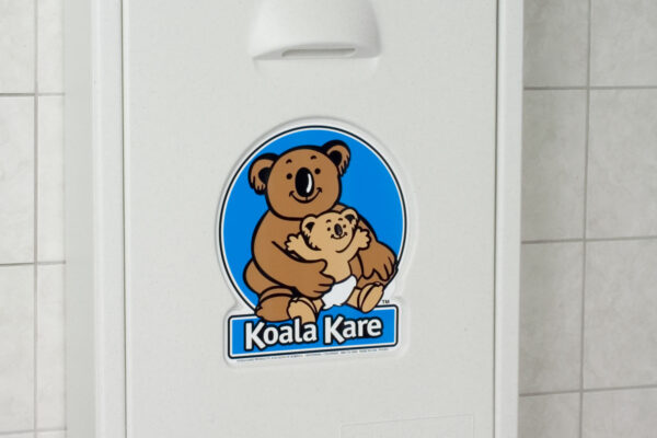 Closed View of White Plastic Koala Kare Vertical Changing Table